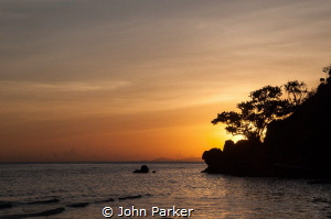 Sunset in Raja Ampat by John Parker 